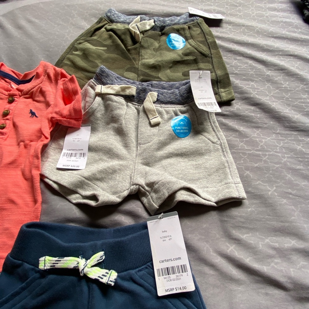Carters New born baby 3 pants one t shirt